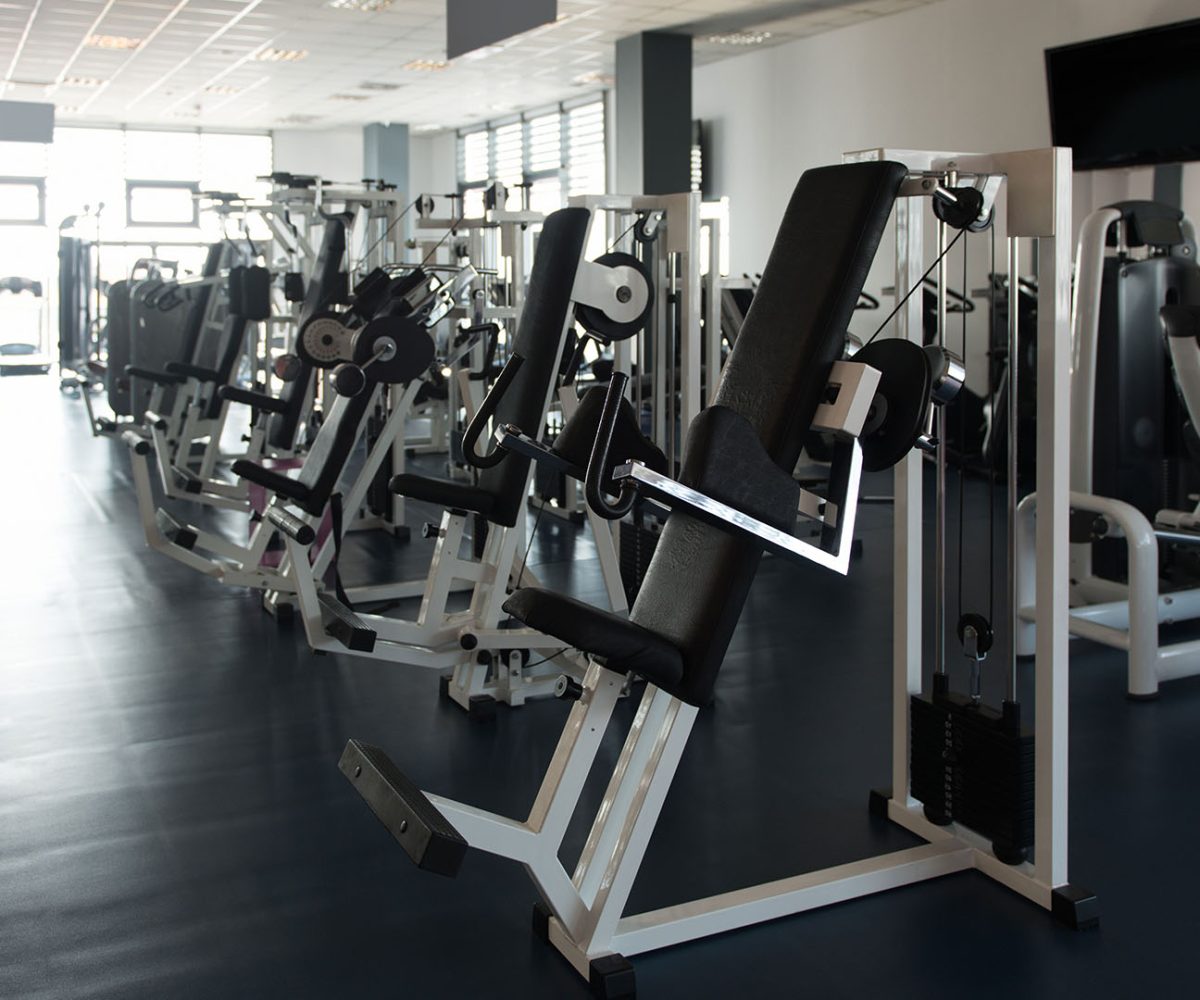 Equipment And Machines At The Modern Gym Room Fitness Center